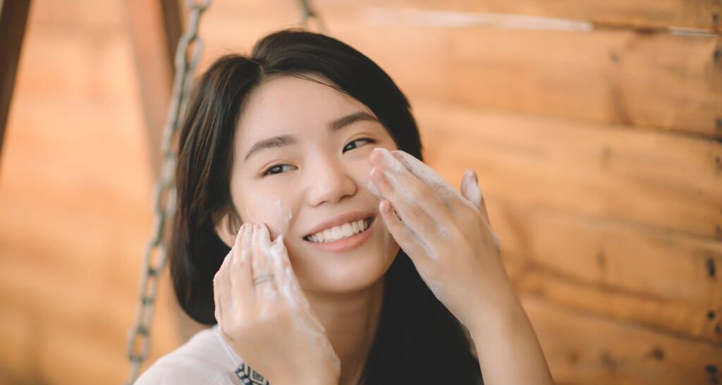 malaysian women using facial cleanser 